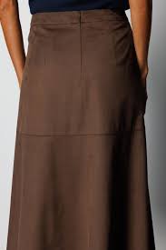 Tüzün: Zamansız Zarafetin Adresi ve Kadın Etek Modelleri