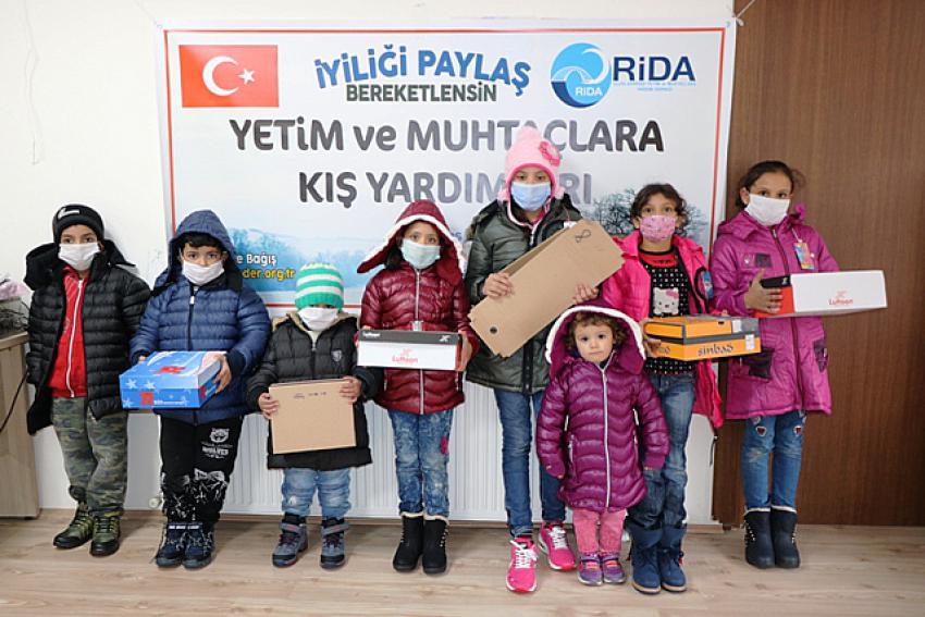 550 YETİM ve MUHTAÇ ÇOCUĞA KIŞLIK MONT ve BOT DAĞITILDI